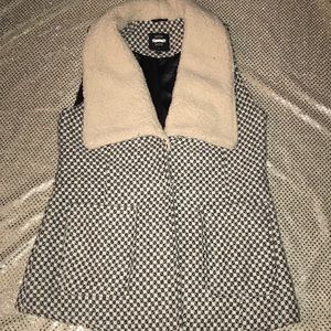 Black and white vest